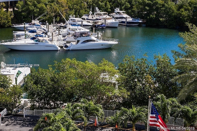 birds eye view of property with a water view