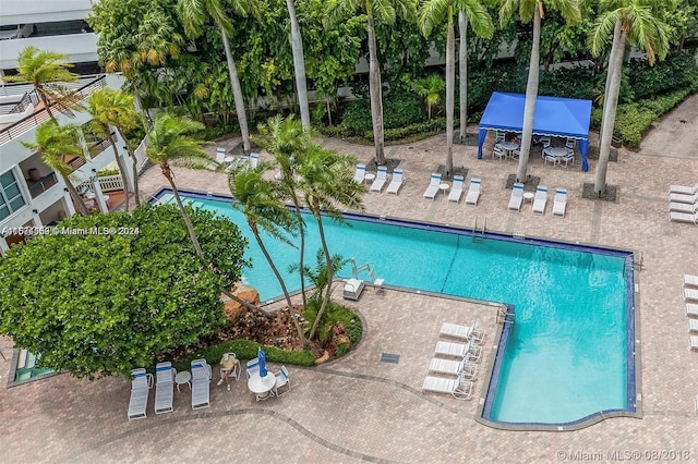 view of swimming pool featuring a patio area