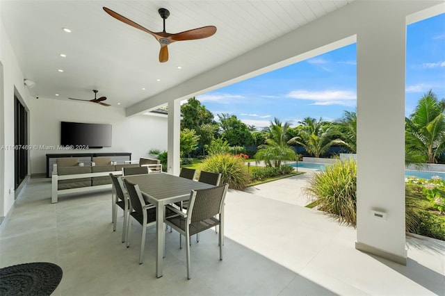 view of patio / terrace featuring ceiling fan