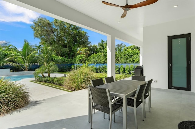 view of patio / terrace featuring ceiling fan