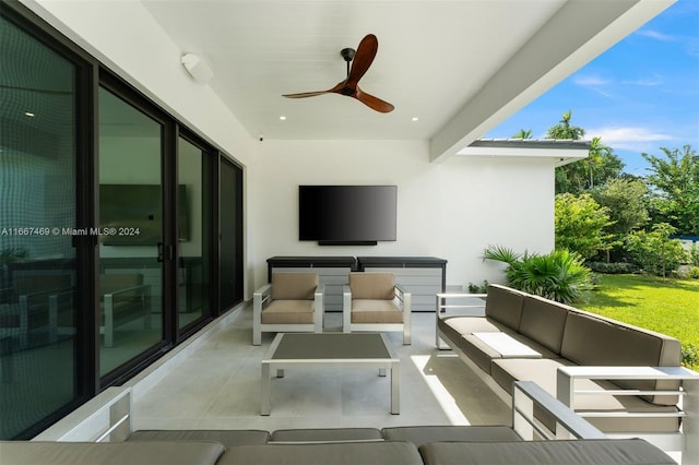 view of patio with ceiling fan and an outdoor hangout area