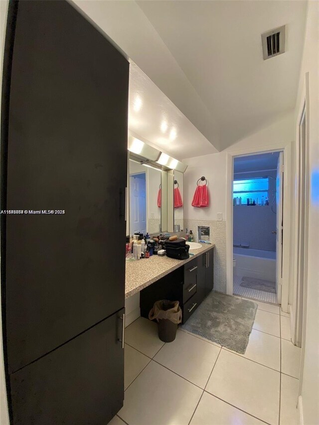 bathroom featuring vanity and tile patterned flooring