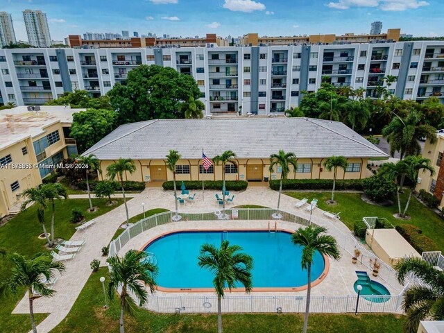 view of swimming pool with a patio area