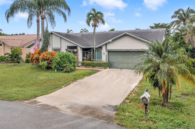 ranch-style home with a garage and a front lawn