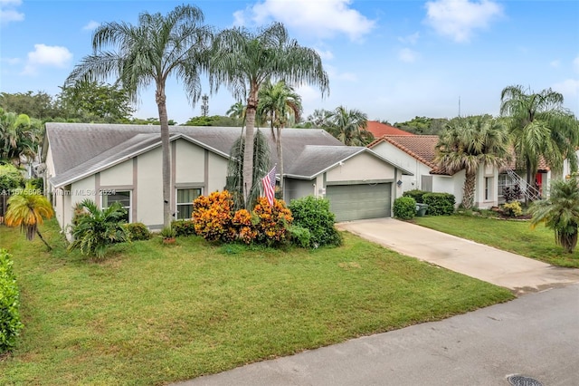 single story home with a garage and a front lawn