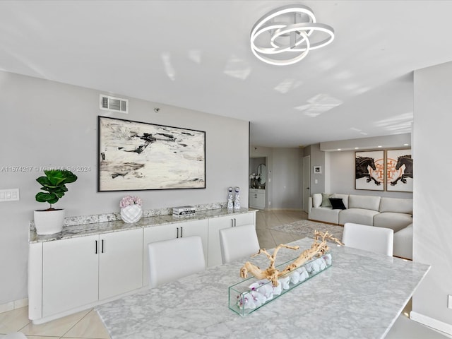 dining room with light tile patterned floors