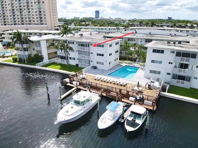 drone / aerial view with a water view