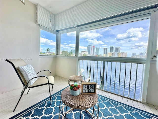 balcony featuring a water view