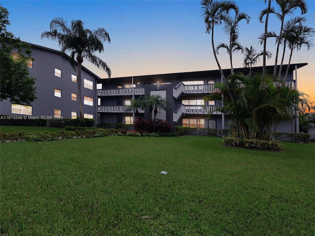 view of outdoor building at dusk