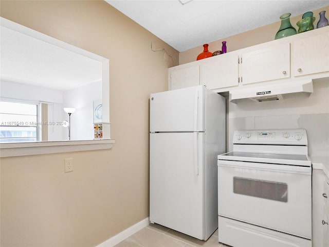 kitchen featuring white cabinetry, white appliances, and light tile patterned floors