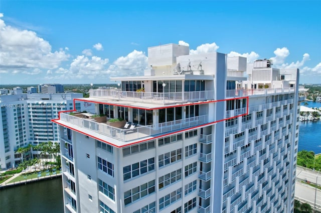 view of property with a water view