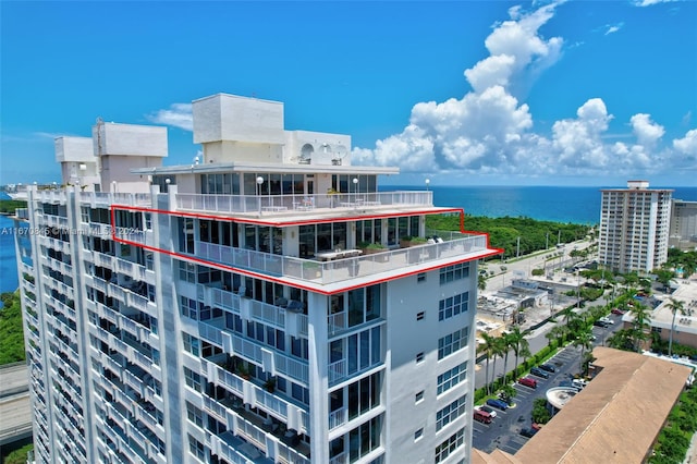 exterior space with a water view