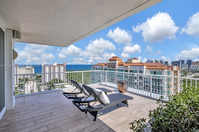 balcony featuring a water view