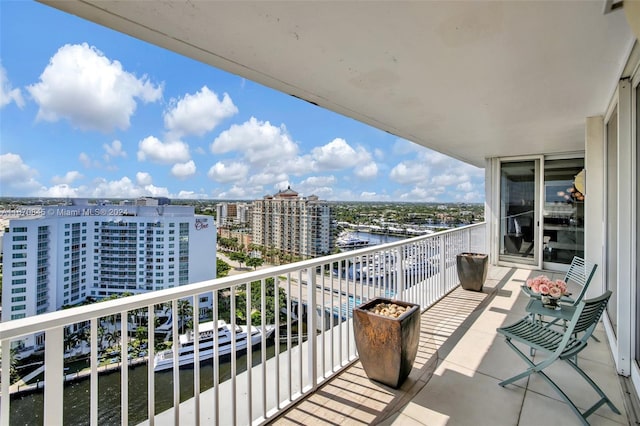 balcony featuring a water view