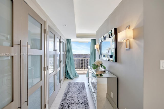 hallway featuring light tile patterned floors