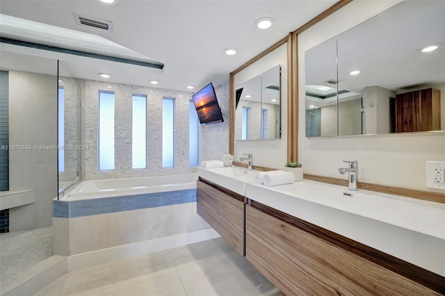 bathroom featuring tile patterned floors, vanity, and independent shower and bath