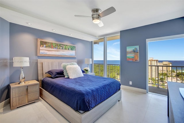 bedroom featuring a water view, access to outside, and ceiling fan