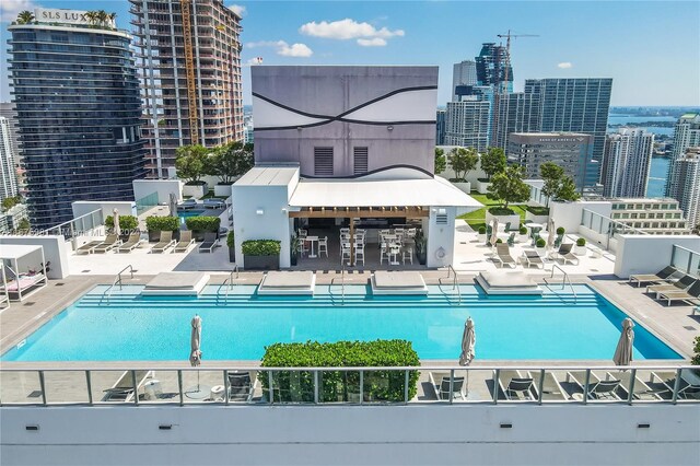 1010 Brickell Ave Unit 1607, Miami, FL 33131 - community pool with a patio and a city view