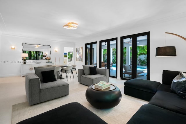 living room featuring crown molding