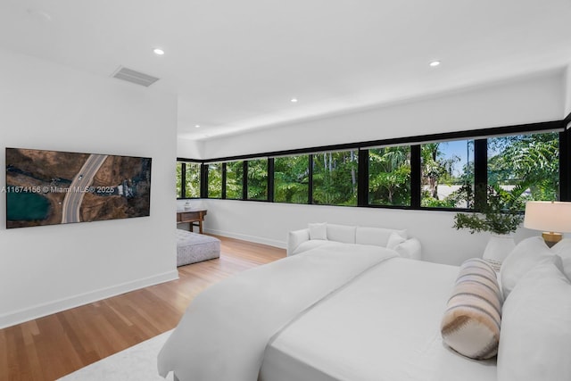 bedroom featuring light hardwood / wood-style floors