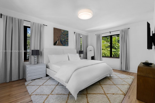 bedroom featuring light wood-type flooring