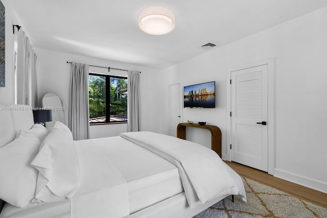 bedroom featuring light hardwood / wood-style flooring