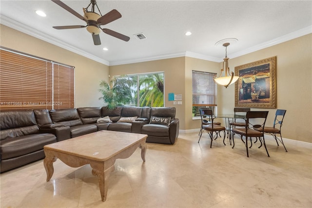 living room featuring crown molding, a textured ceiling, and ceiling fan