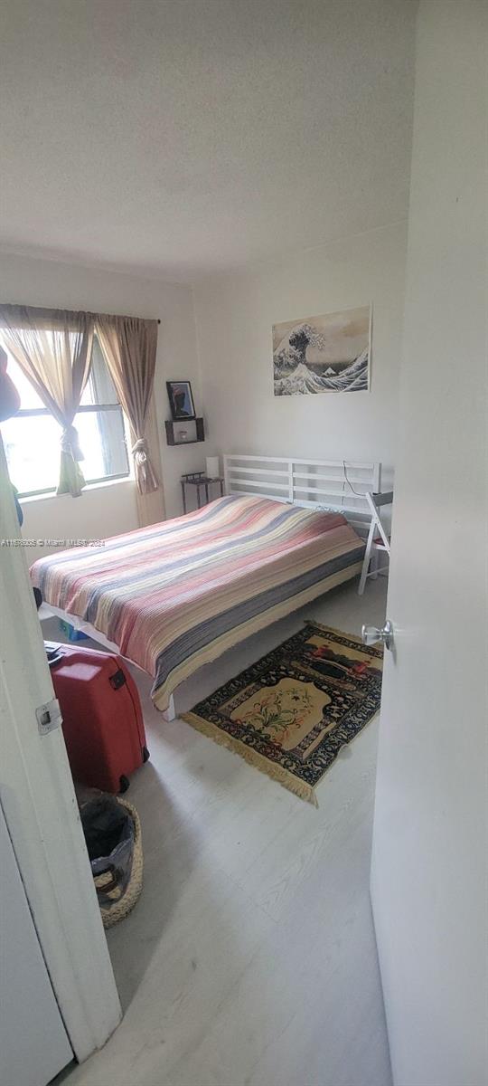 bedroom with a textured ceiling