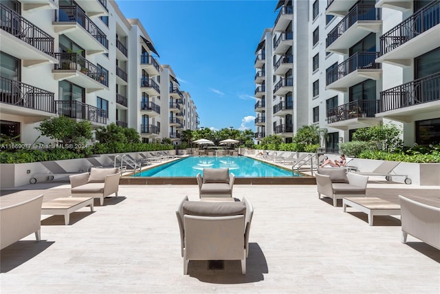 view of pool with an outdoor hangout area and a patio