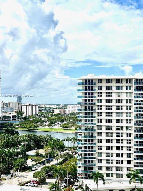 view of building exterior with a water view