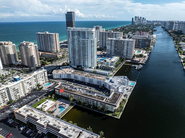 birds eye view of property featuring a water view