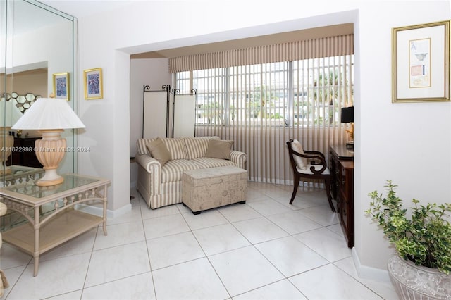 living room with light tile patterned flooring