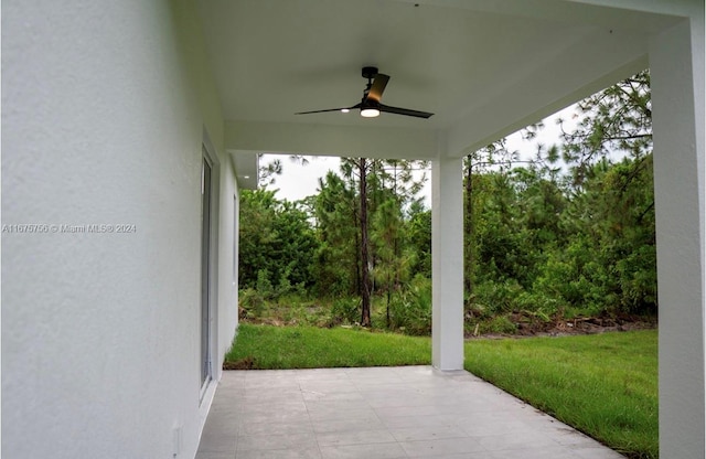 view of patio / terrace featuring ceiling fan