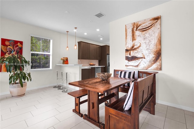 view of tiled dining area