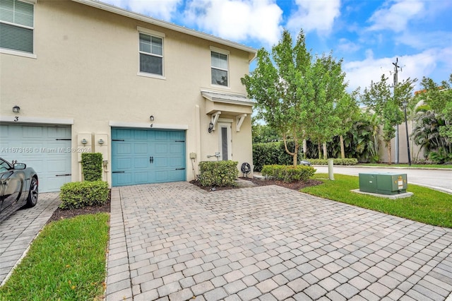 view of front of home with a garage