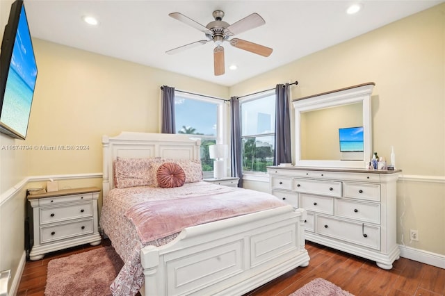 bedroom featuring dark wood-type flooring and ceiling fan