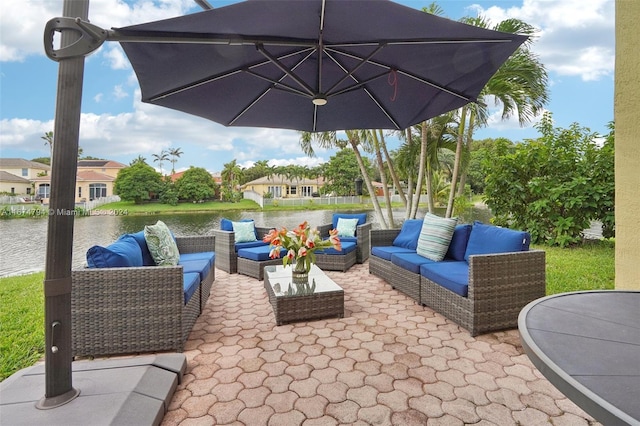 view of patio / terrace featuring a water view