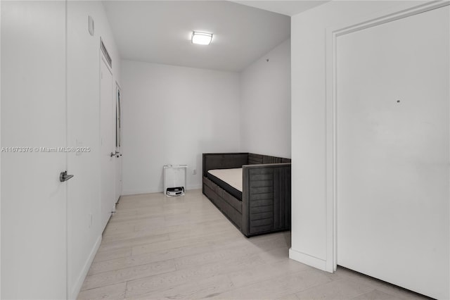 bathroom featuring hardwood / wood-style flooring