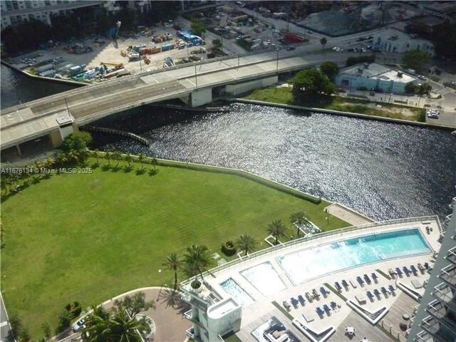 drone / aerial view with a water view