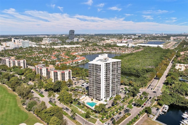 drone / aerial view featuring a water view and a city view