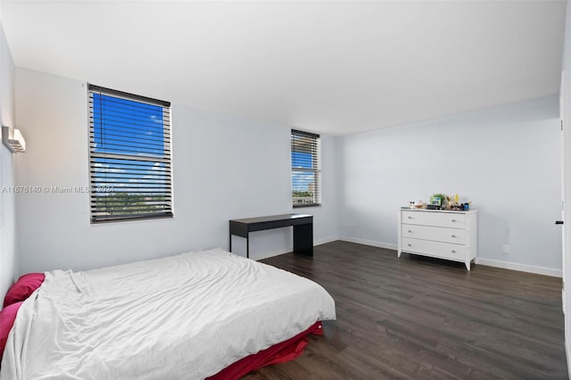 bedroom featuring dark hardwood / wood-style floors