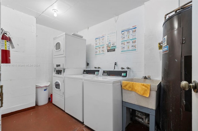 clothes washing area featuring washer and clothes dryer and stacked washer and clothes dryer