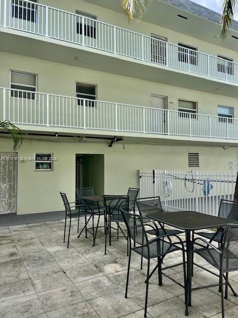 view of patio / terrace with a balcony