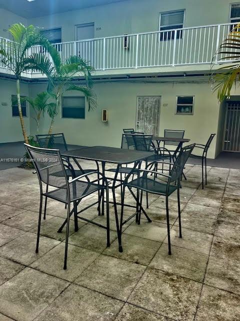 view of patio / terrace with a balcony