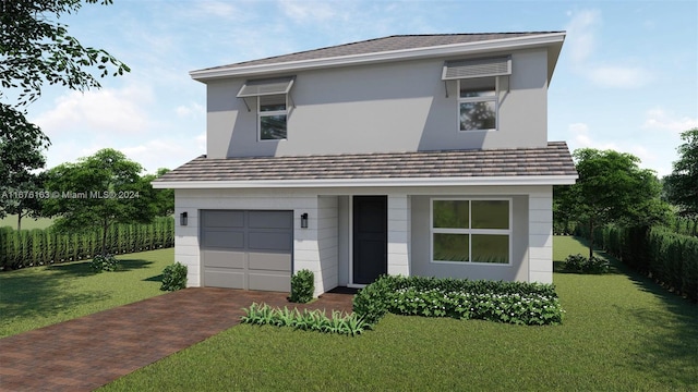 view of front of home featuring a garage and a front yard