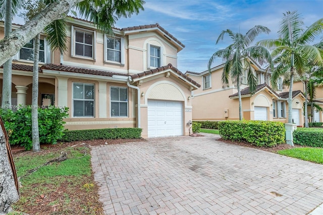 view of front of home with a garage