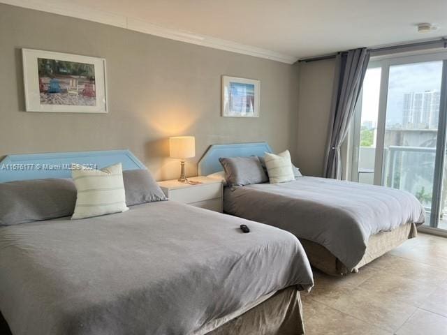 tiled bedroom with multiple windows and ornamental molding