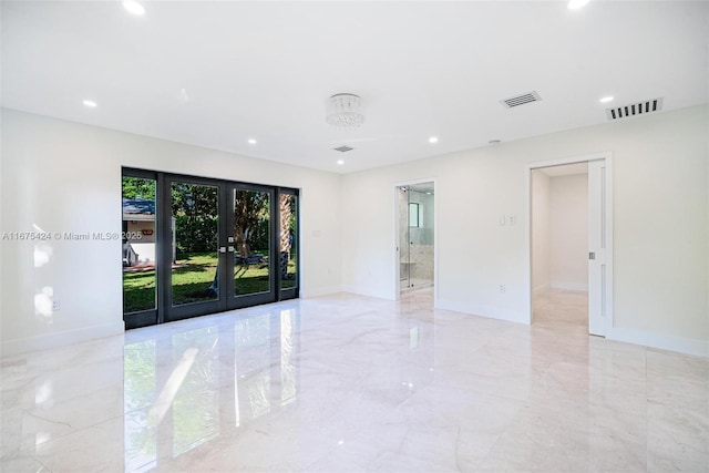 unfurnished room featuring marble finish floor, recessed lighting, baseboards, and french doors