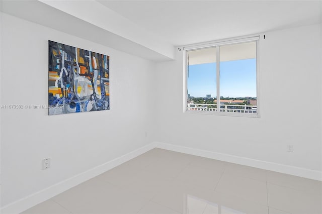 empty room featuring tile patterned flooring