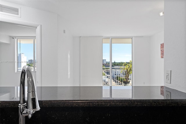 interior space with dark stone counters